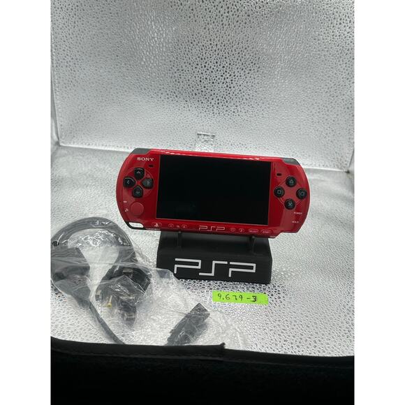 Red and black psp 3000 w/charger adapter, new battery & has glass screen lens - Picture 5 of 9